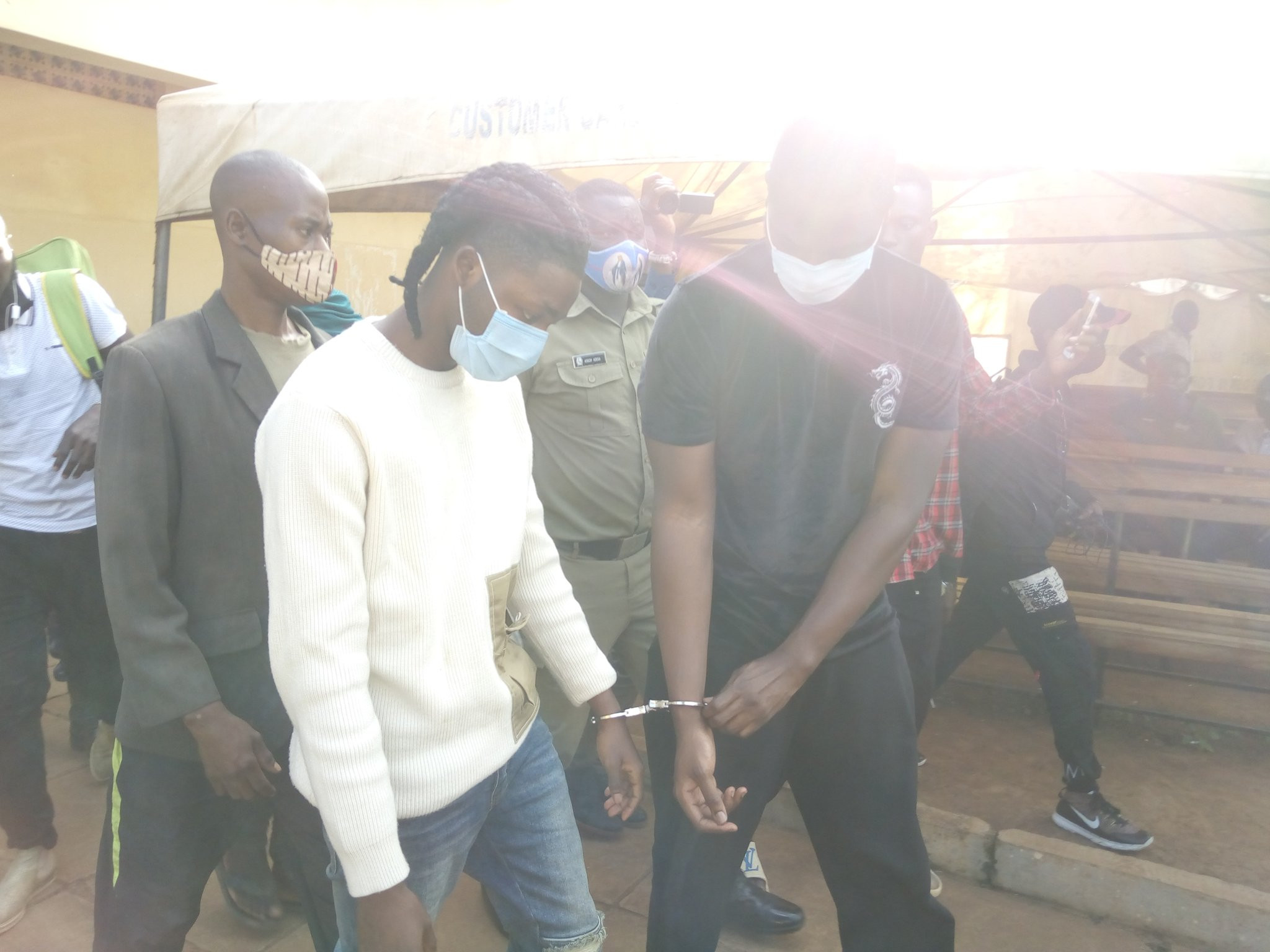 Photos of Omah Lay in handcuff and being taken to prison in Uganda lindaikejisblog 2
